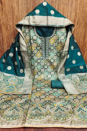 Women's teal handwork dress material