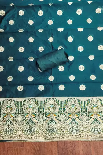 Women's teal handwork dress material