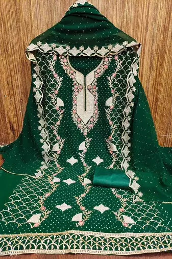 Women's dark green embroidered dress material