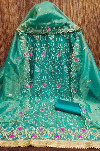 Women's turquoise embroidered dress material