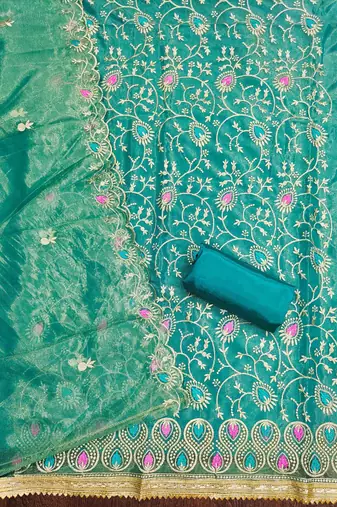 Women's turquoise embroidered dress material