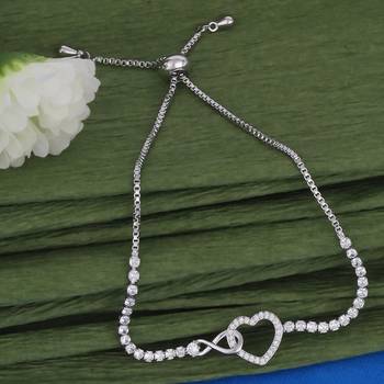 Splendid heart shape silver plated free size charm bracelet for women 1
