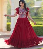 Maroon color faux georgette fabric designer gown crafted with beauds and sequins work