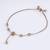 Superb square shape gold plated free size charm bracelet for women