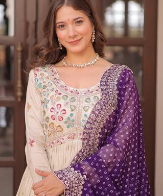 Off white color cosmos jacquard embroidered partywear gown with dupatta 4