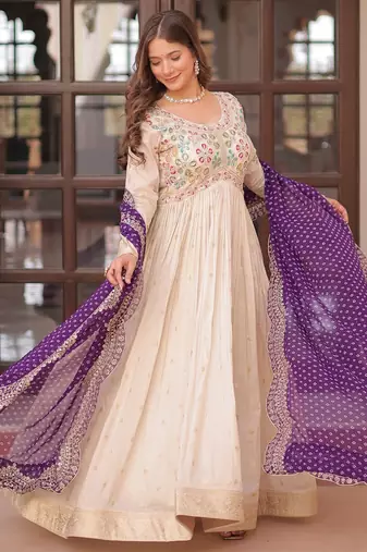 Off white color cosmos jacquard embroidered partywear gown with dupatta