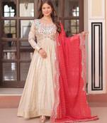 Off white color cosmos jacquard embroidered partywear gown with dupatta