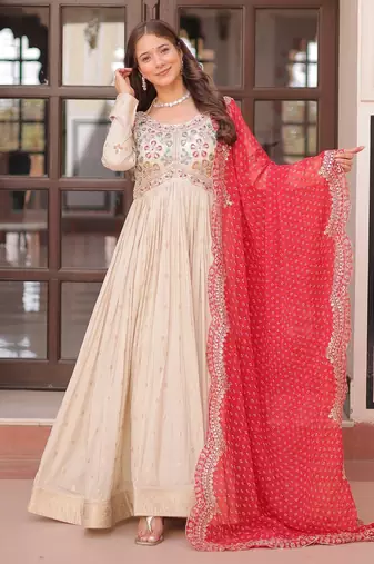 Off white color cosmos jacquard embroidered partywear gown with dupatta
