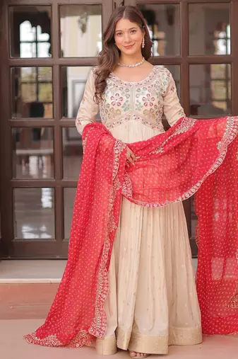 Off white color cosmos jacquard embroidered partywear gown with dupatta