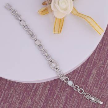 Exotic round shape silver plated free size charm bracelet for women 1
