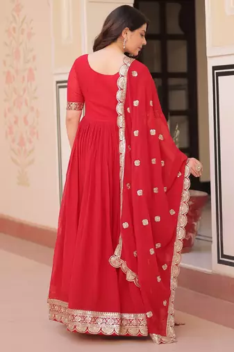 Red color faux georgette ceremonial partywear gown with dupatta