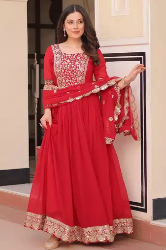 Red color faux georgette ceremonial partywear gown with dupatta