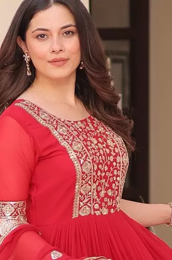 Red color faux georgette ceremonial partywear gown with dupatta