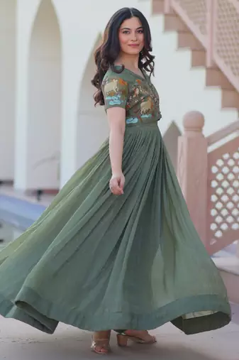 Green color silver crunchy embroidered gown with koti
