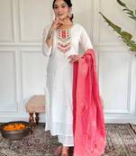 Off white color viscosee blend fabric ceremonial wear embroidery work with wevon kurta set