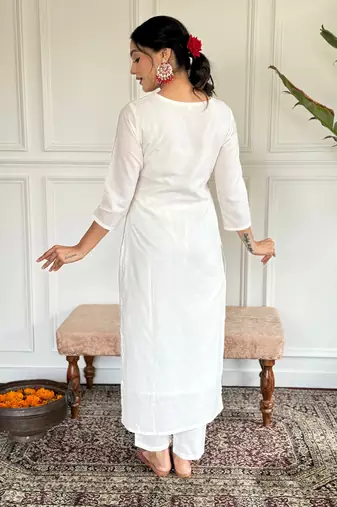 Off white color viscosee blend ceremonial wear embroidery with wevon kurta set