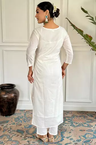 Off white color viscosee blend ceremonial wear embroidery with wevon kurta set