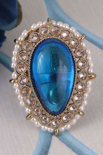 Splendid oval shape center blue stone gold plated adjustable finger ring for women