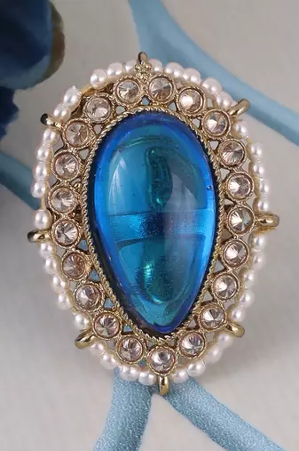 Splendid oval shape center blue stone gold plated adjustable finger ring for women