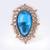 Splendid oval shape center blue stone gold plated adjustable finger ring for women