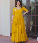 Yellow color faux georgette beads embroidery work ethnic and ceremonial wear gown
