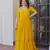 Yellow color faux georgette beads embroidery work ethnic and ceremonial wear gown