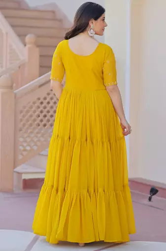 Yellow color faux georgette beads embroidery and ceremonial wear gown