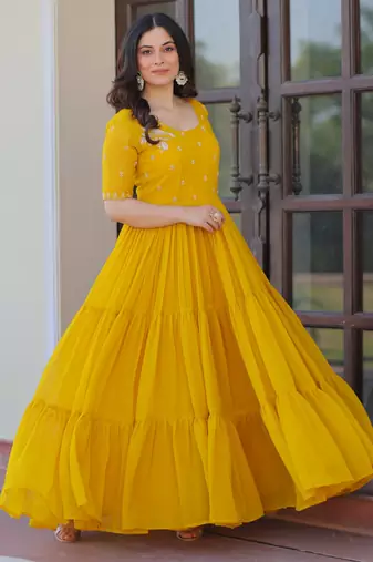 Yellow color faux georgette beads embroidery and ceremonial wear gown