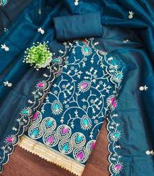 Women's teal embroidered dress material