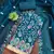 Women's teal embroidered dress material