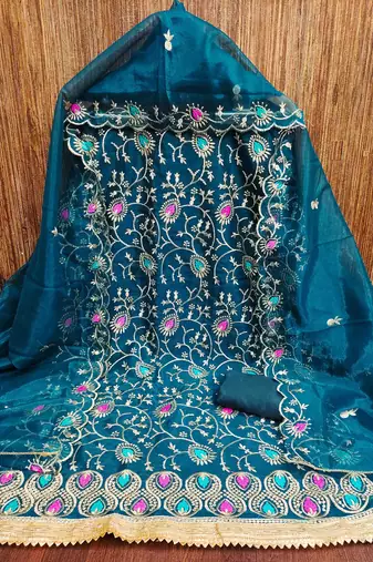 Women's teal embroidered dress material