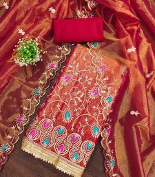 Women's rust embroidered dress material