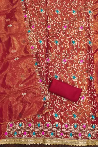 Women's rust embroidered dress material