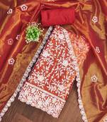 Women's rust embroidered dress material