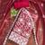 Women's red embroidered dress material