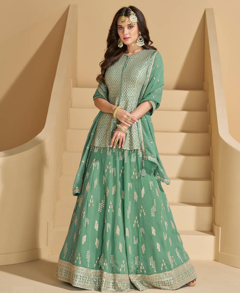 Green color ethnic georgette fabric heavy wedding reception wear ghaghra suit