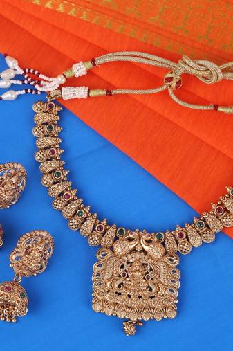 Traditional laxmi and peacock design gold plated choker necklace set for women