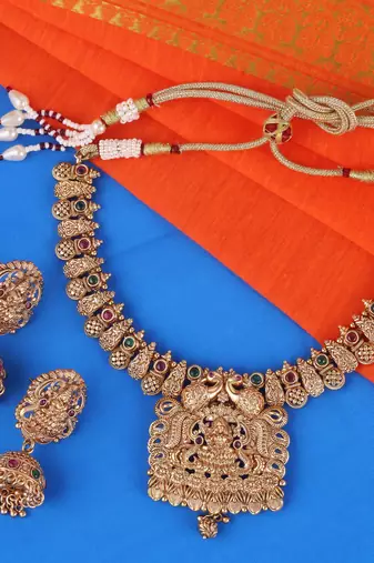 Traditional laxmi and peacock design gold plated choker necklace set for women