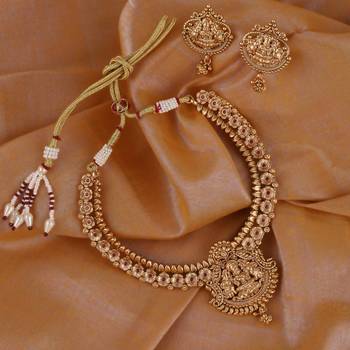 Traditional laxmi and flower design gold plated choker necklace set for women 1