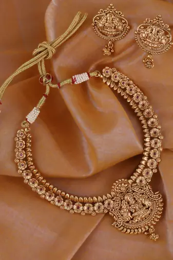Traditional laxmi and flower design gold plated choker necklace set for women