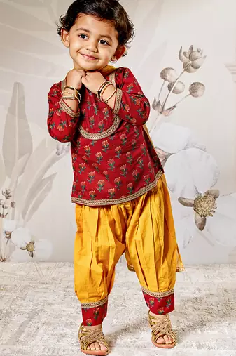 Girl's traditional raksha bandhan outfit - red cotton kurta patiala set with dupatta floral print for festival wear