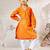 Girl's traditional raksha bandhan outfit - orange cotton kurta with white leggings set for casual festival wear