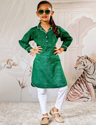 Girl's traditional raksha bandhan outfit - green cotton kurta with white leggings set for casual festival wear 1