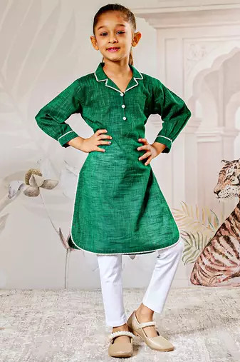 Girl's traditional raksha bandhan outfit - green cotton kurta with white leggings set for casual festival wear