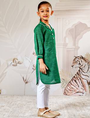 Girl's traditional raksha bandhan outfit - green cotton kurta with white leggings set for casual festival wear 4