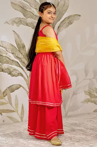 Girl's traditional raksha bandhan outfit - red rayon kurta palazzo set with organza dupatta for festival wear