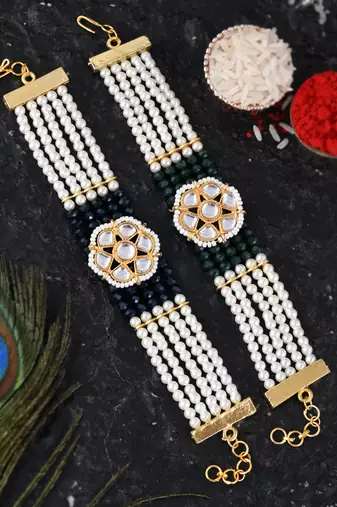 Handcrafted pearl & gold bead rakhi