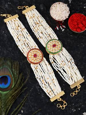 Handcrafted pearl & gold bead rakhi 1