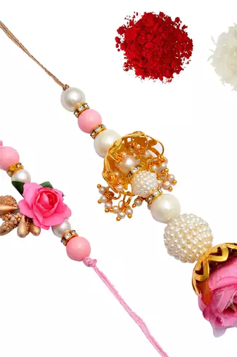 Handcrafted pearl & gold bead rakhi