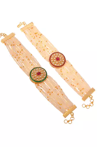Handcrafted pearl & gold bead rakhi